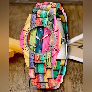 Women’s colorful wooden watch. Bamboo strap with classic quartz analogue face.